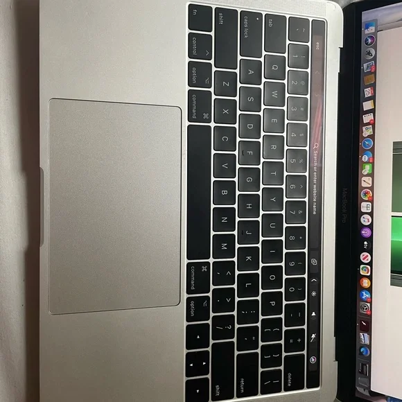 MacBook Pro 13 inch Touch Bar feature included
